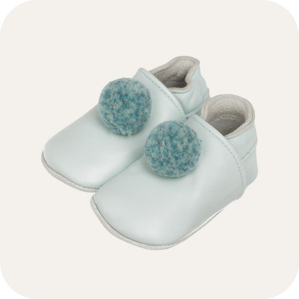 Chaussons bébé à pompons – Bleu cie