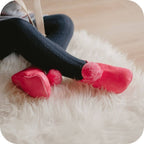 Chaussons bébé à pompons – Fuchsia
