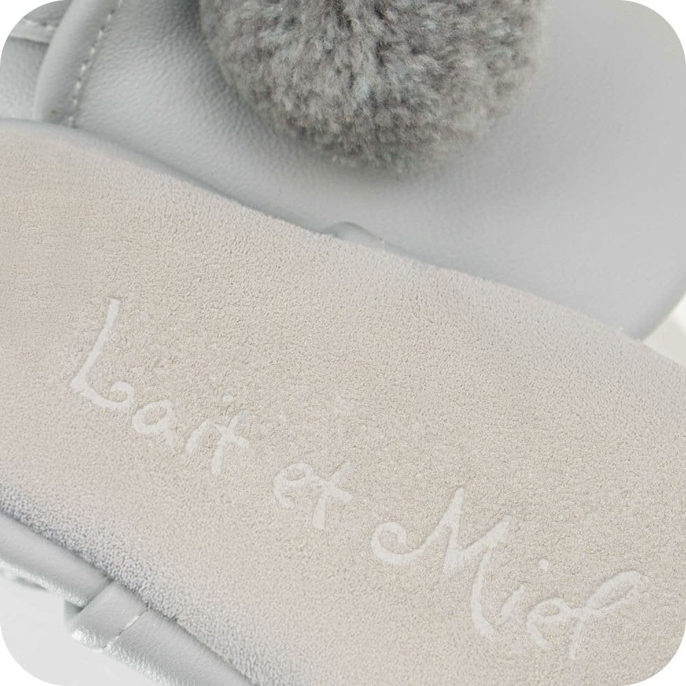 Chaussons bébé à pompons – Gris