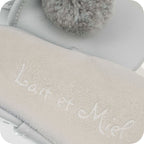 Chaussons bébé à pompons – Gris