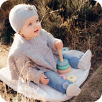 Chaussons bébé à pompons – Gris