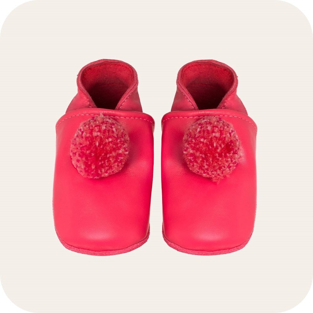 Chaussons bébé à pompons – Fuchsia