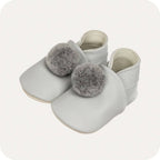 Chaussons bébé à pompons – Gris